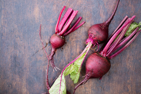 Fresh organic beets, with topsの写真素材