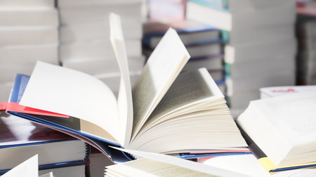 Open book in the library. Education concept. Selective focus.