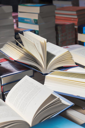 Open book, hardback books on table. Back to school. Copy space.の写真素材