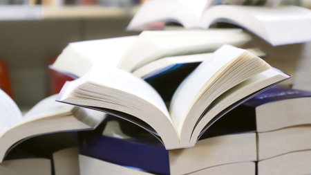 Books on the bookshelf in the library. Selective focus.