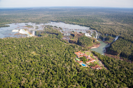 Aerial bird's-eye view panorama of Iguazu Falls from above, from a helicopter. Border of Brazil and Argentina. Parque Nacional Iguazu, Iguassu Department. Parque Nacional do Iguacu, Parana State.の写真素材