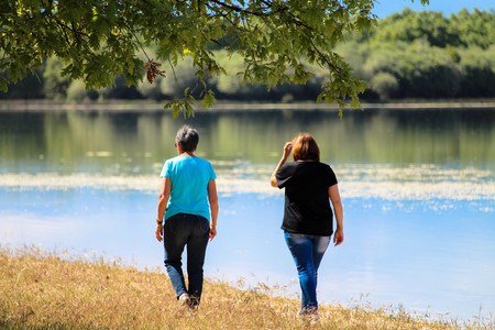 walking on the shore of the lakeの写真素材