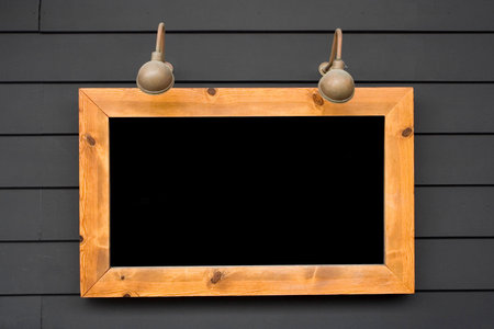 Billboard illuminated by two lamp posts - advertising and markting conceptsの写真素材