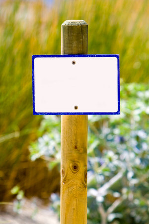 small information billboard in the beach