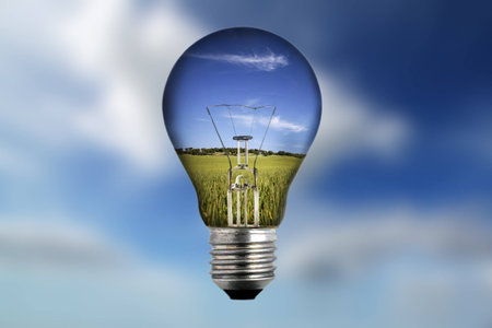 light bulb with landscape inside - environmental conceptの写真素材