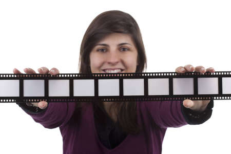 young woman holding film photo frame isolated on white background - you can insert your own text or photos in the framesの写真素材