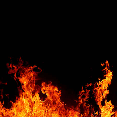 intense and vivid fire on black background - square formatの写真素材