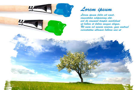 Painting landscape with paintbrushes with copyspace for your textの写真素材