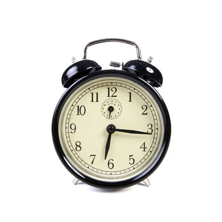 old vintage alarm clock isolated on white backgroundの写真素材