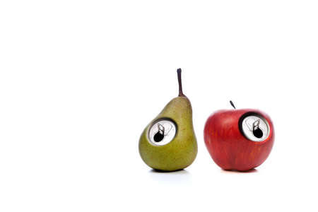 red apple and green pear isolated on white backgroundの写真素材