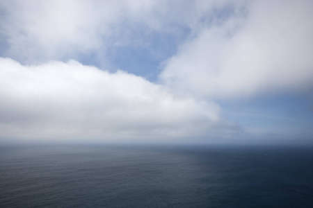 Clouds over ocean seascape - landscape orientationの写真素材