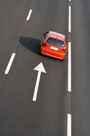 lonely car in empty highway - landscape orientationの写真素材