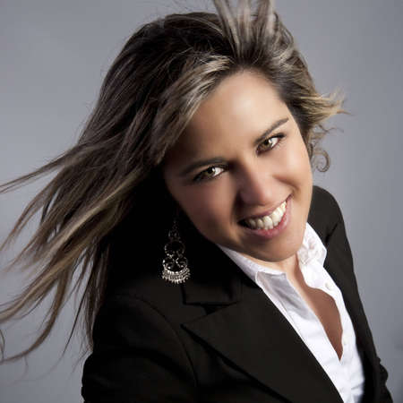 young model fashion portrait in grey backgroundの写真素材