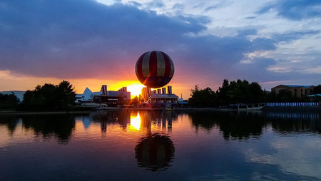 This nature picture with the title sunset over a body of water was taken in Austria by Malou...