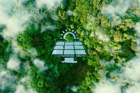 A lake in the middle of a pristine rainforest in the shape of a solar power plant symbolizing the benefits and eco-friendliness of green renewable energy. 3d rendering.の写真素材