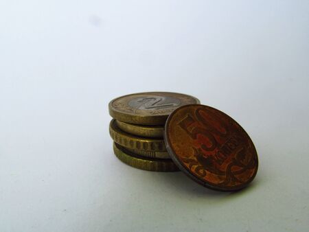 Old coins from different countries isolated on white. Treasure conceptの写真素材