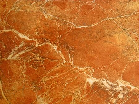 Brown ceramic floor with a pattern. The texture of the ceramic tile.の写真素材