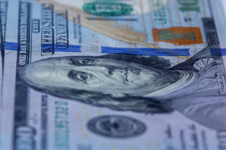 Selective focus, background image of one hundred dollar bills. Picture for business and currency...