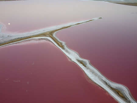Pink lake in Mexico City, due to the high salt content develops algae that give a pink tinge.の写真素材