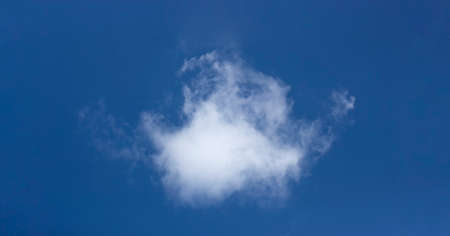 White cloud on a blue sky background.の写真素材