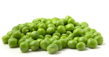Young green peas on a pile, sweet beans, fresh vegetablesの写真素材