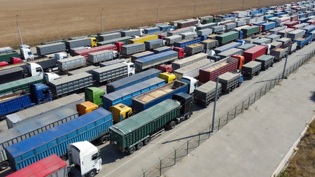 Long queue in the parking lot for trucks. Logistics. Export of agricultural productsの写真素材