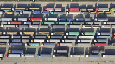Logistic transportation of agricultural products. Parking in the queue of trucks for unloading at the port terminalの写真素材