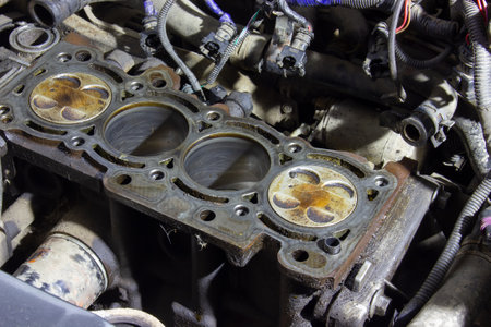 4 cylinders of the car engine in oil, the engine disassembled during repairの写真素材