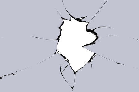 Broken glass hole. Photo of cracks on the window. texture for design.の写真素材