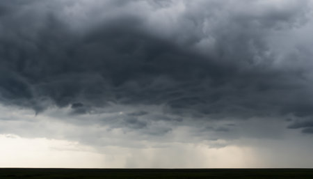 Nature's fury brews within the ebony heart of the storm cloudsの素材