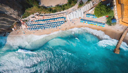 Coastal beauty: Top view of a beach and wavesの素材
