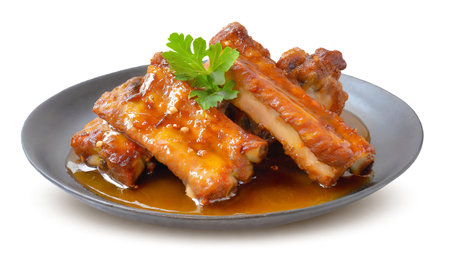 Roasted ribs in a plate on a white backgroundの素材