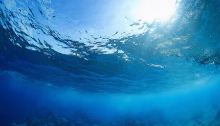 Blue background of ocean water at depthの素材