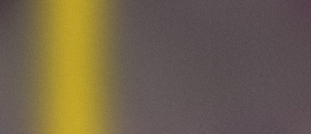 Highgrain abstract image featuring a bold yellow stripe against a dark backgroundの写真素材