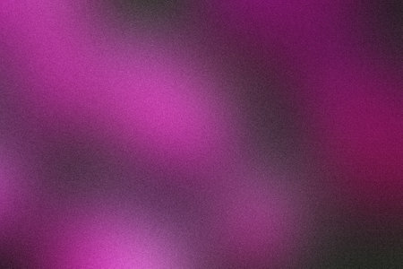 Artistic backgrounds featuring a highgrain texture and a blend of pink and purple shadesの写真素材