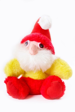 Christmas Toy Gnome  dressed as Santa Claus Isolated On Whiteの写真素材