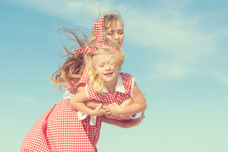 Happy family. Young happy beautiful  mother and her daughter  having fun. Positive human emotions, feelings, emotions.の写真素材