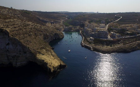 Xlendi Bay in the morningの写真素材