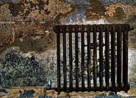 HDR image of an old water radiator heater full of rustの写真素材