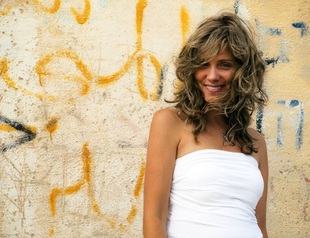 Beautiful female model in a dilapidated urban setting