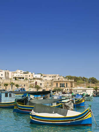 Traditional fishing boats of Malta in the fishing village of Marsaxlokkの写真素材
