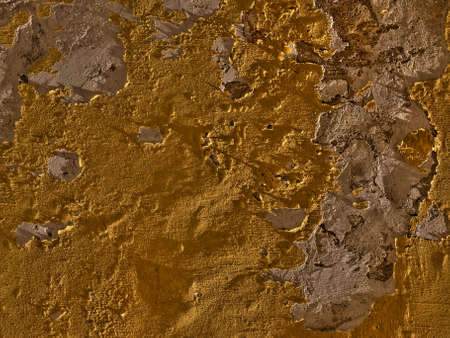 Detail HDR image of crumbling or flaking plaster on a limestone wallの写真素材