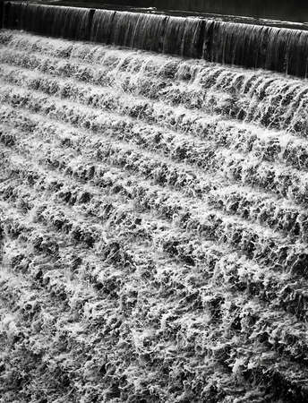 Water flowing down a terraced wall in Chadwick Lakes in Maltaの写真素材