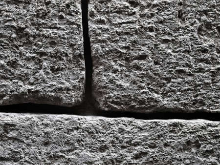 Texture and detail of an old limestone wallの写真素材