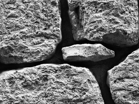 Texture and detail of an old limestone wallの写真素材