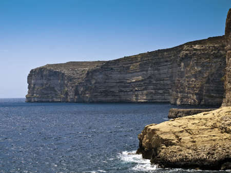 Beautiful cliff face at Xlendi in Gozo in Maltaの写真素材
