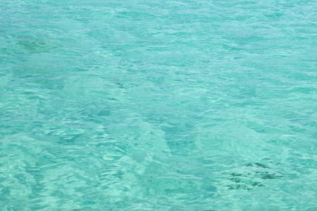 The beautiful colour of the waters at The Blue Lagoon in Comino in Maltaの写真素材