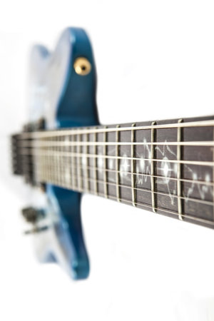 Electric guitar detail shots over white backdrop