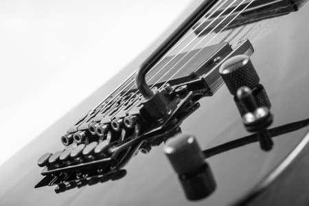 Electric guitar detail shots over white backdropの写真素材