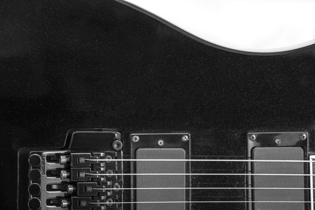 Electric guitar detail shots over white backdropの写真素材